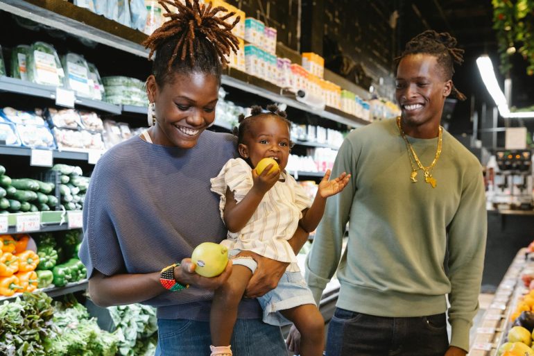 grocery shopping budget a family buying groceries in a supermarket