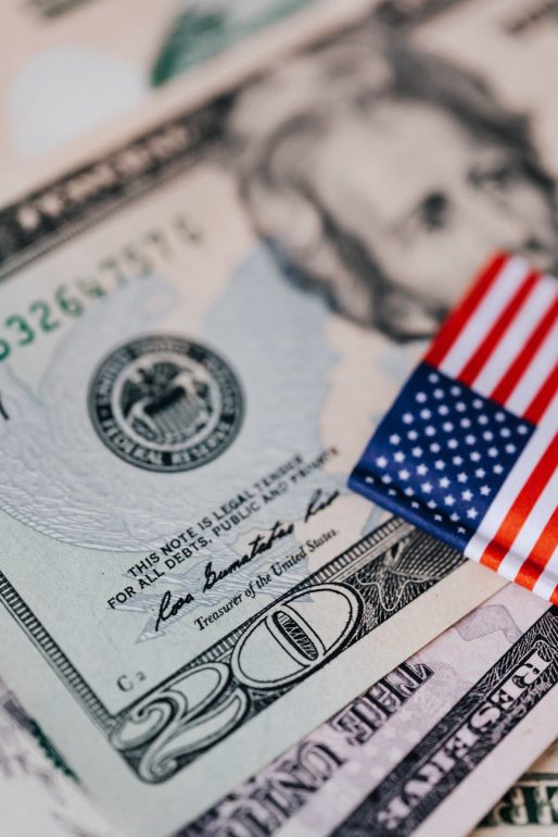 Illinois government spending set of paper banknotes and small flag of usa